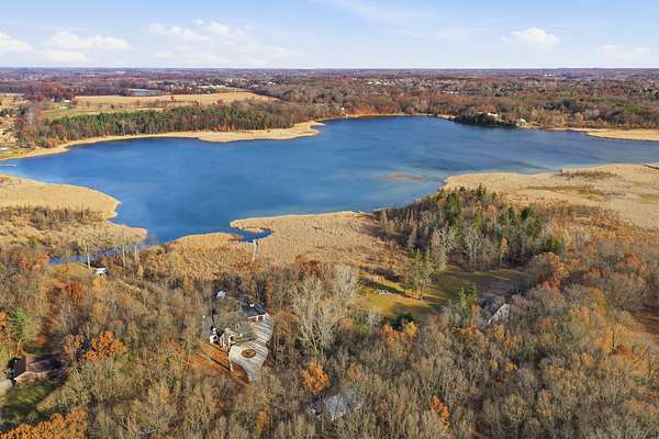 10.2 Acres of Recreational Land with Home for Sale in Fenton, Michigan