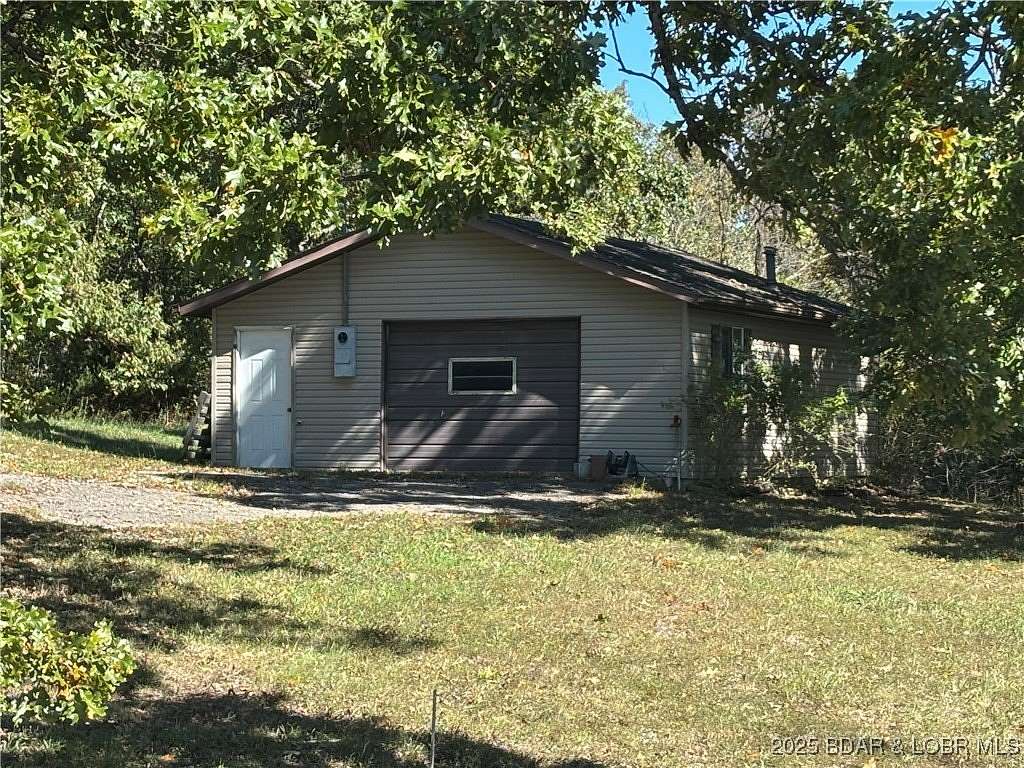 1.4 Acres of Commercial Land for Sale in Laurie, Missouri