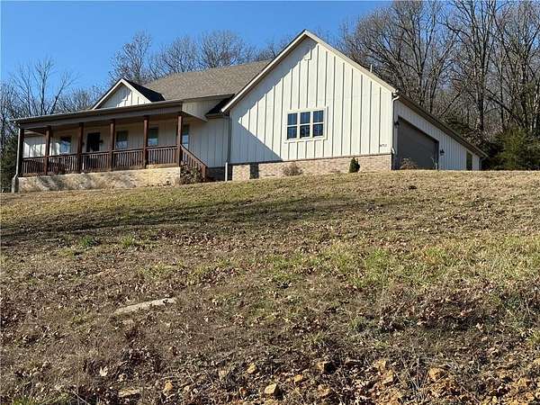 7.78 Acres of Residential Land with Home for Sale in Prairie Grove, Arkansas