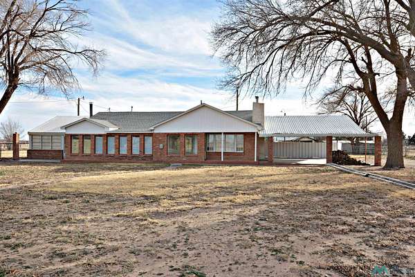4.85 Acres of Residential Land with Home for Sale in Portales, New Mexico