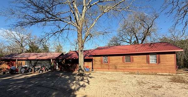 22.3 Acres of Agricultural Land with Home for Sale in Palestine, Texas