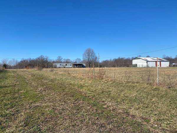 8.59 Acres of Land with Home for Sale in Liberty, Kentucky