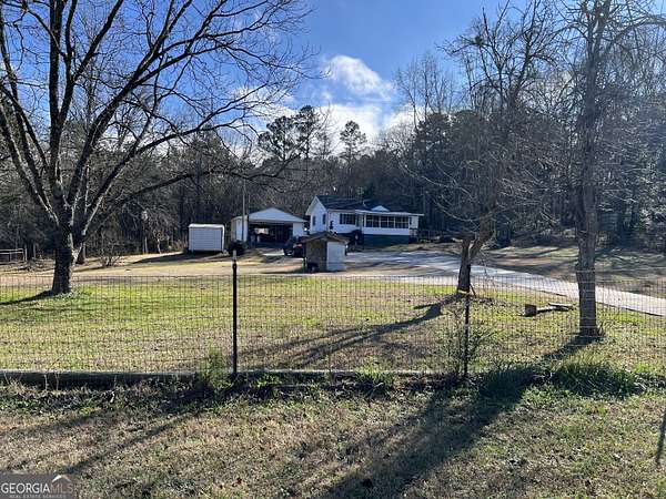2.33 Acres of Residential Land with Home for Sale in Locust Grove, Georgia