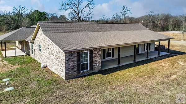 2.19 Acres of Residential Land with Home for Sale in Maud, Texas