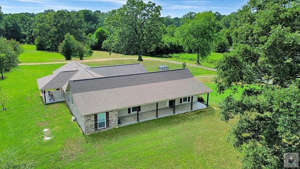 2.19 Acres of Land with Home for Sale in Maud, Texas