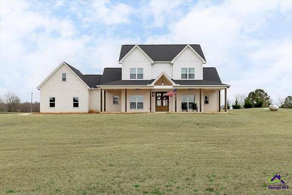 1.84 Acres of Residential Land with Home for Sale in Hawkinsville, Georgia