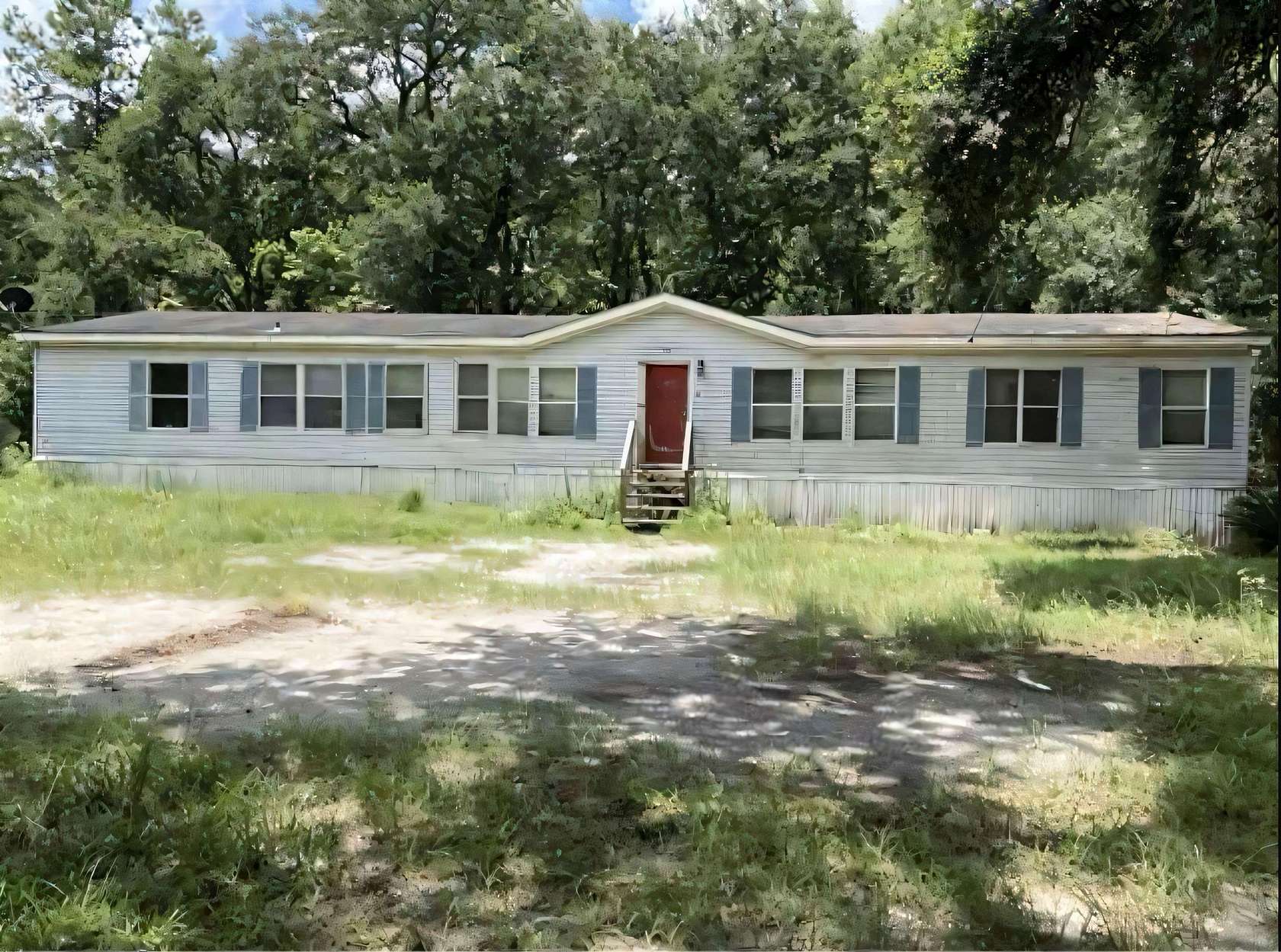 7.2 Acres of Residential Land with Home for Sale in Crawfordville, Florida