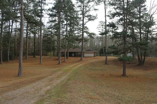 25.8 Acres of Recreational Land with Home for Sale in Umpire, Arkansas