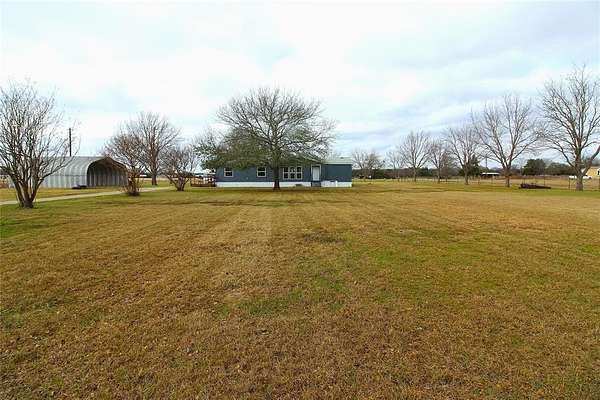 1.5 Acres of Residential Land with Home for Sale in Scurry, Texas