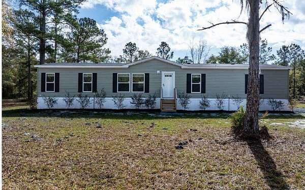 9.86 Acres of Residential Land with Home for Sale in Lake City, Florida