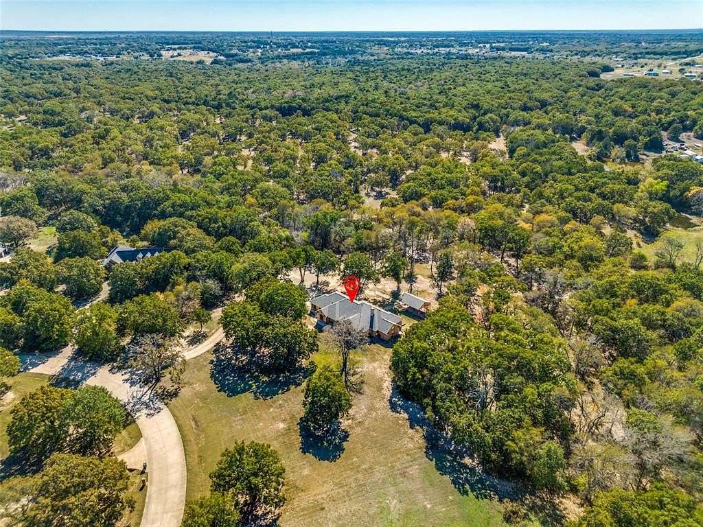 2.65 Acres of Residential Land with Home for Sale in Scurry, Texas