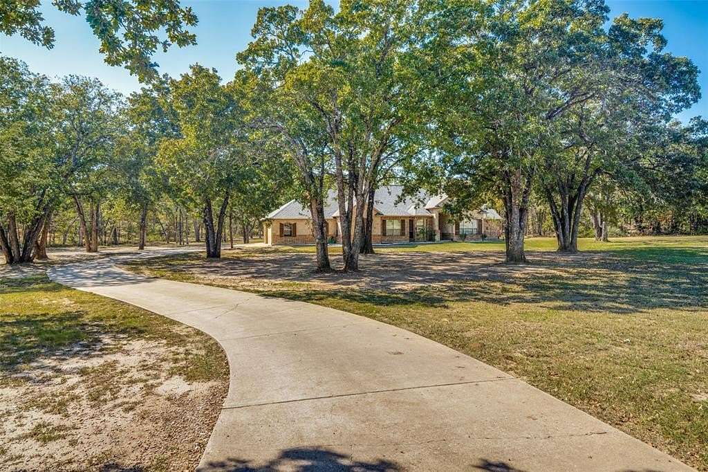 2.65 Acres of Land with Home for Sale in Scurry, Texas