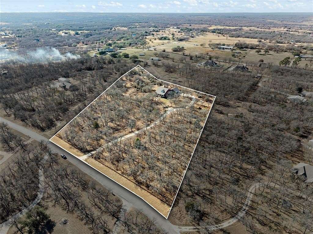 5.89 Acres of Residential Land with Home for Sale in Paradise, Texas