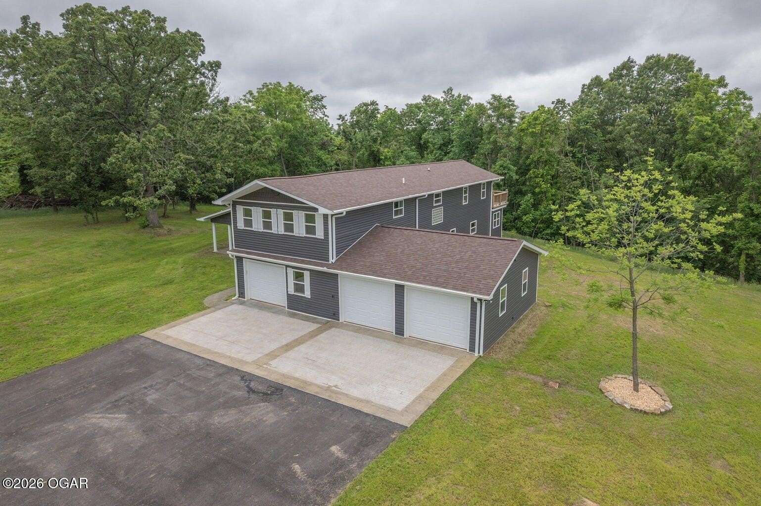 8 Acres of Residential Land with Home for Sale in Goodman, Missouri