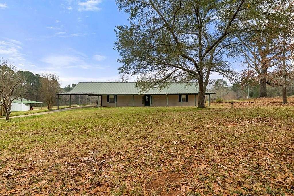 18.4 Acres of Land with Home for Sale in San Augustine, Texas