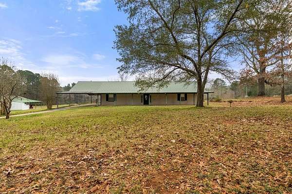 18.4 Acres of Land with Home for Sale in San Augustine, Texas