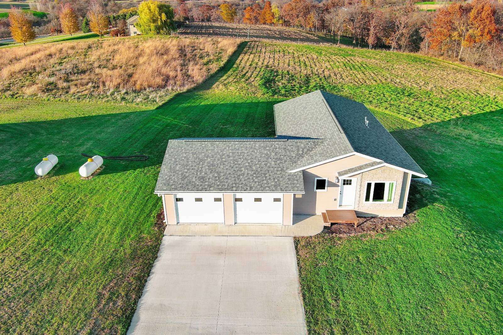 3 Acres of Land with Home for Sale in Dorchester, Iowa