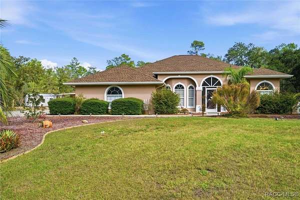 2 Acres of Residential Land with Home for Sale in Beverly Hills, Florida