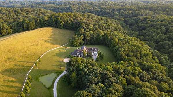 33.4 Acres of Recreational Land with Home for Sale in Rockbridge, Ohio