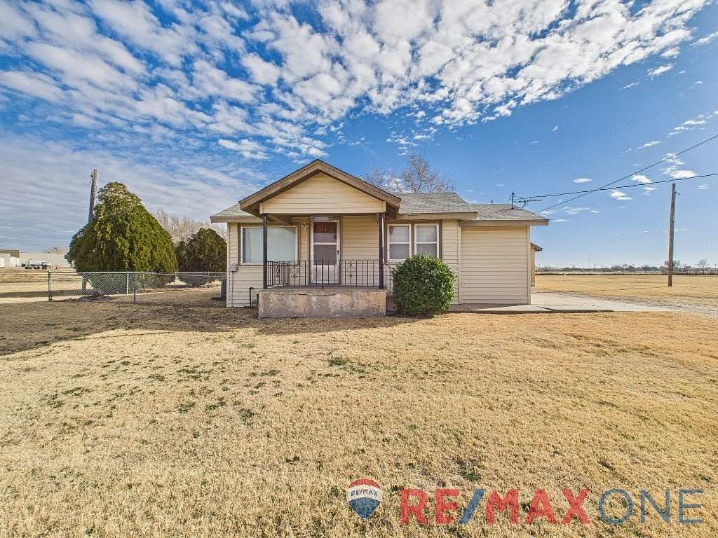 4.9 Acres of Residential Land with Home for Sale in Garden City, Kansas