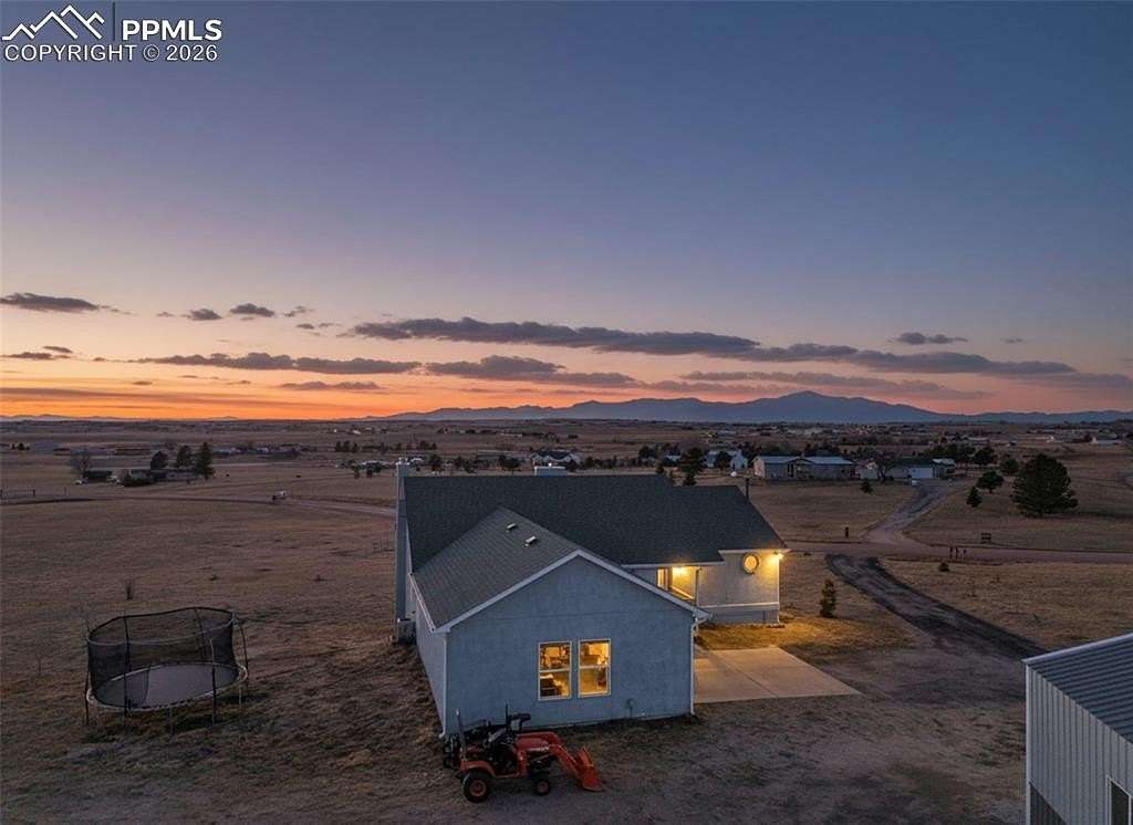 5 Acres of Residential Land with Home for Sale in Peyton, Colorado