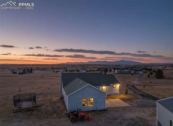 5 Acres of Residential Land with Home for Sale in Peyton, Colorado