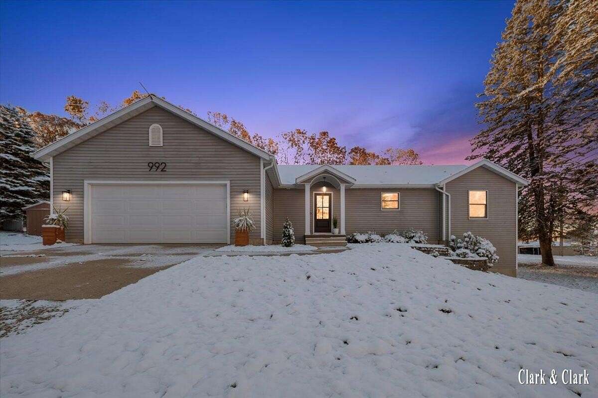 1.5 Acres of Residential Land with Home for Sale in Lowell, Michigan