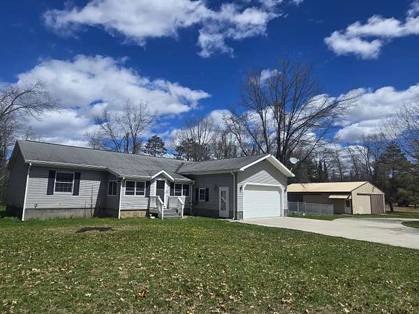 5.72 Acres of Land with Home for Sale in Atlanta, Michigan