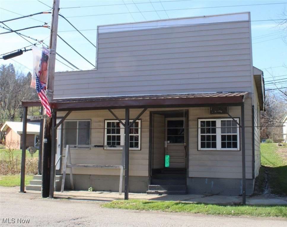 0.27 Acres of Mixed-Use Land for Auction in Corning, Ohio