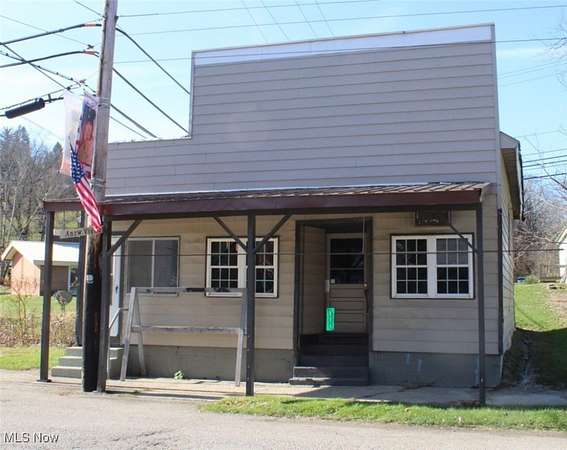 0.27 Acres of Mixed-Use Land for Auction in Corning, Ohio