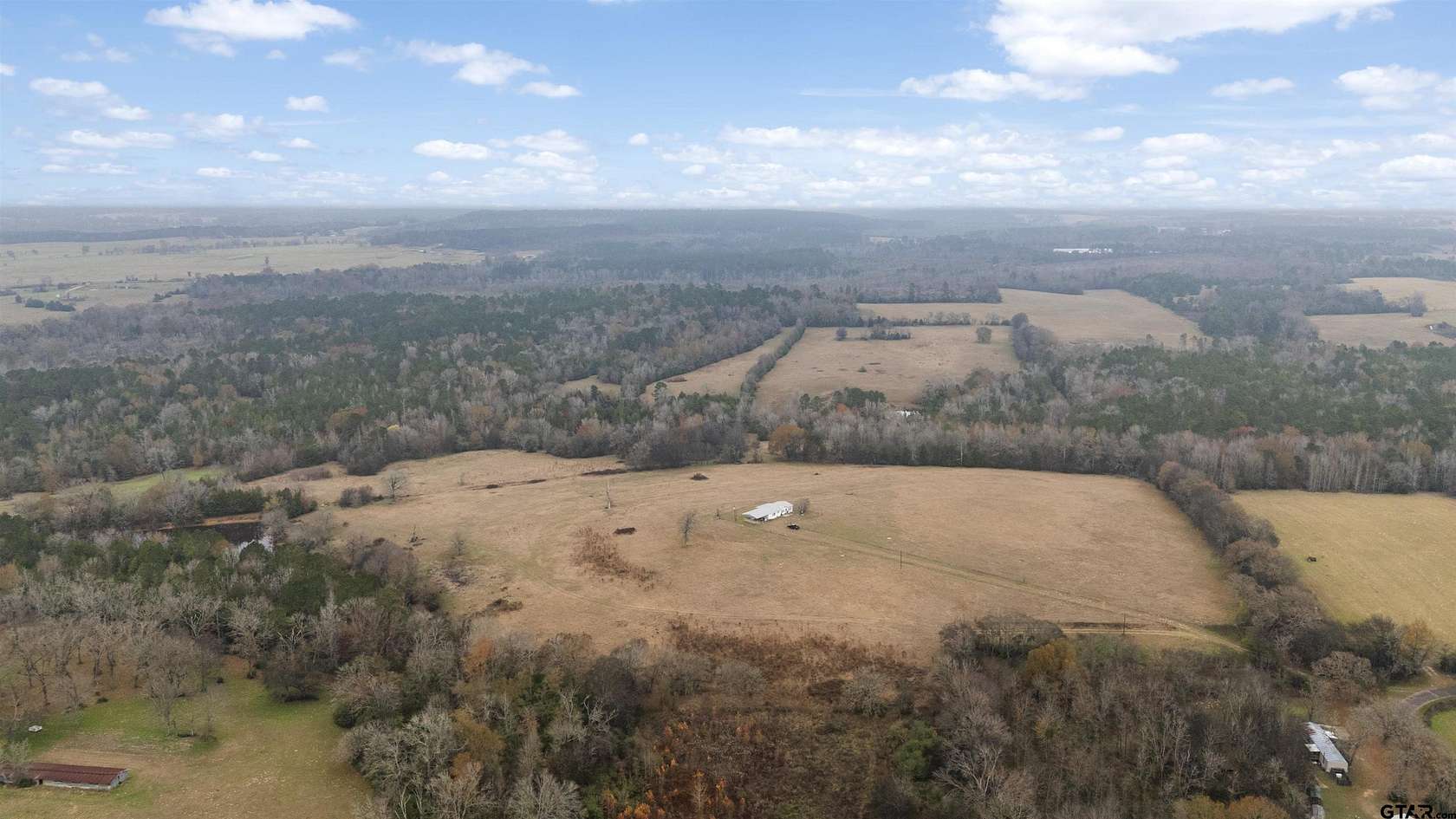 92.2 Acres of Agricultural Land with Home for Sale in Alto, Texas