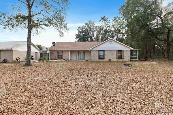 10.4 Acres of Land with Home for Sale in Silverhill, Alabama