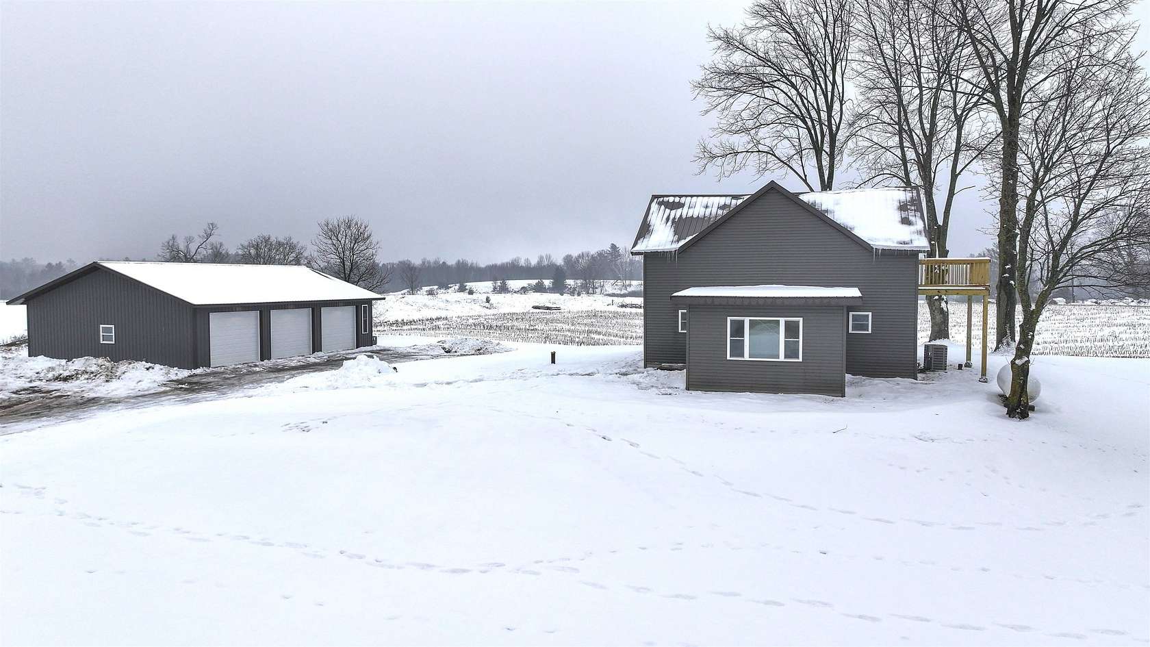 1.63 Acres of Residential Land with Home for Sale in Hatley, Wisconsin