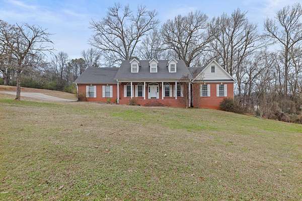 2.47 Acres of Land with Home for Sale in Russellville, Alabama