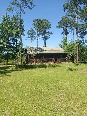 42.7 Acres of Recreational Land with Home for Sale in Cairo, Georgia