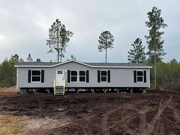 1.84 Acres of Residential Land with Home for Sale in Waynesville, Georgia