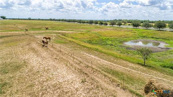 32.3 Acres of Agricultural Land with Home for Sale in La Vernia, Texas