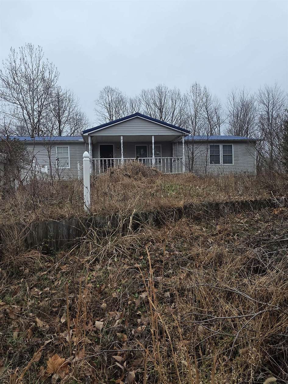 5 Acres of Residential Land with Home for Sale in Olive Hill, Kentucky