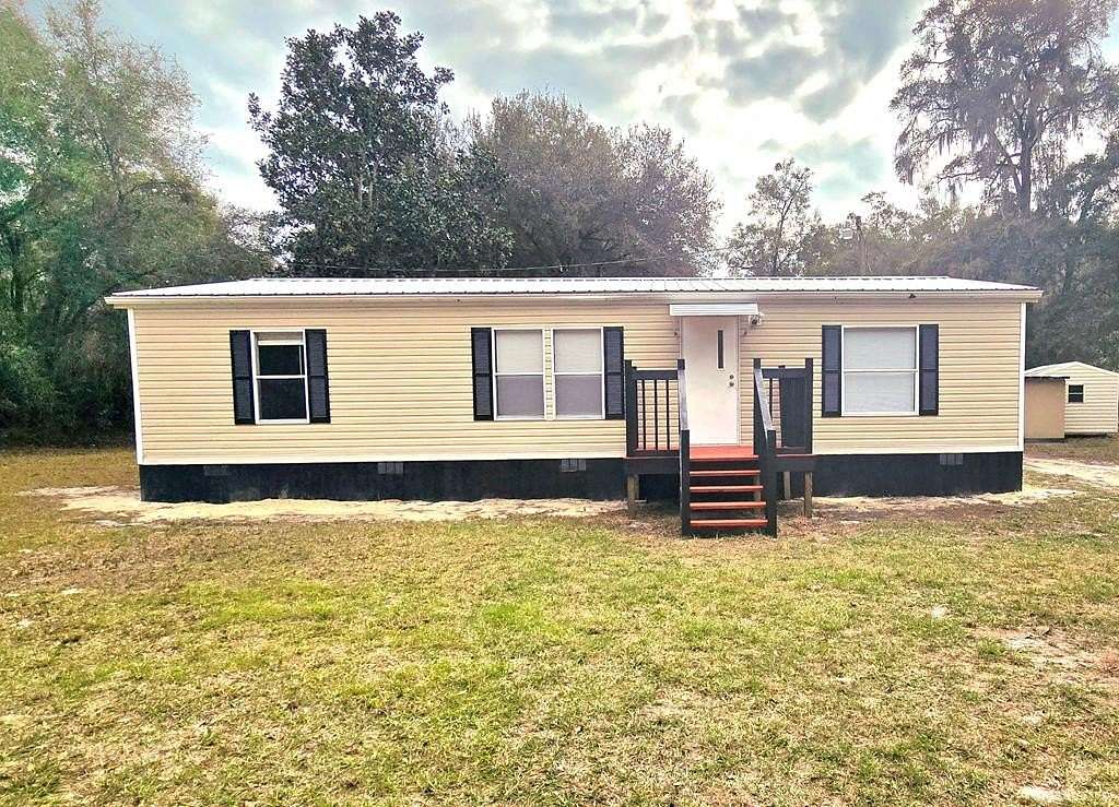 4.5 Acres of Land with Home for Sale in Chiefland, Florida