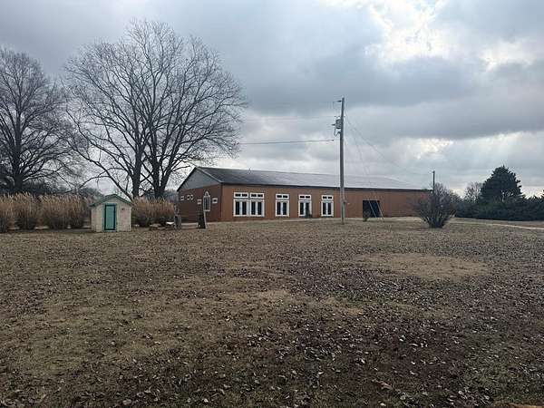 4 Acres of Residential Land with Home for Sale in Trezevant, Tennessee