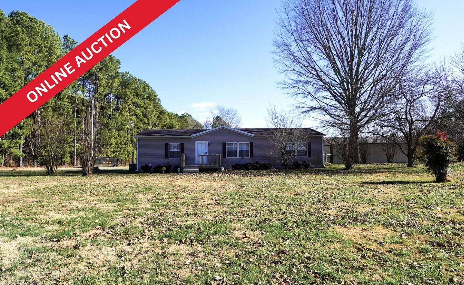 8.52 Acres of Residential Land with Home for Auction in Cedar Hill, Tennessee