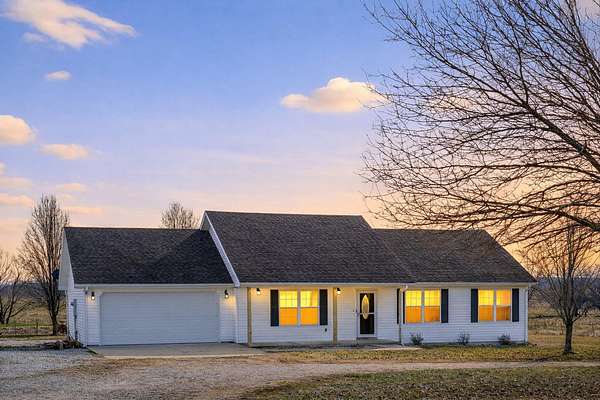 2.5 Acres of Residential Land with Home for Sale in Humansville, Missouri