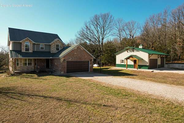 9.8 Acres of Land with Home for Sale in Fair Grove, Missouri