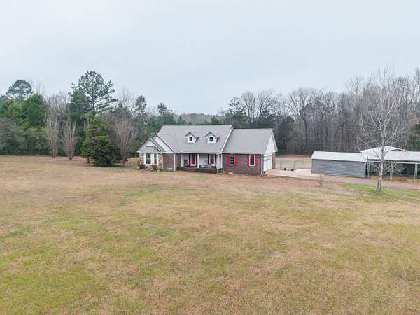 7.1 Acres of Residential Land with Home for Sale in Belmont, Mississippi