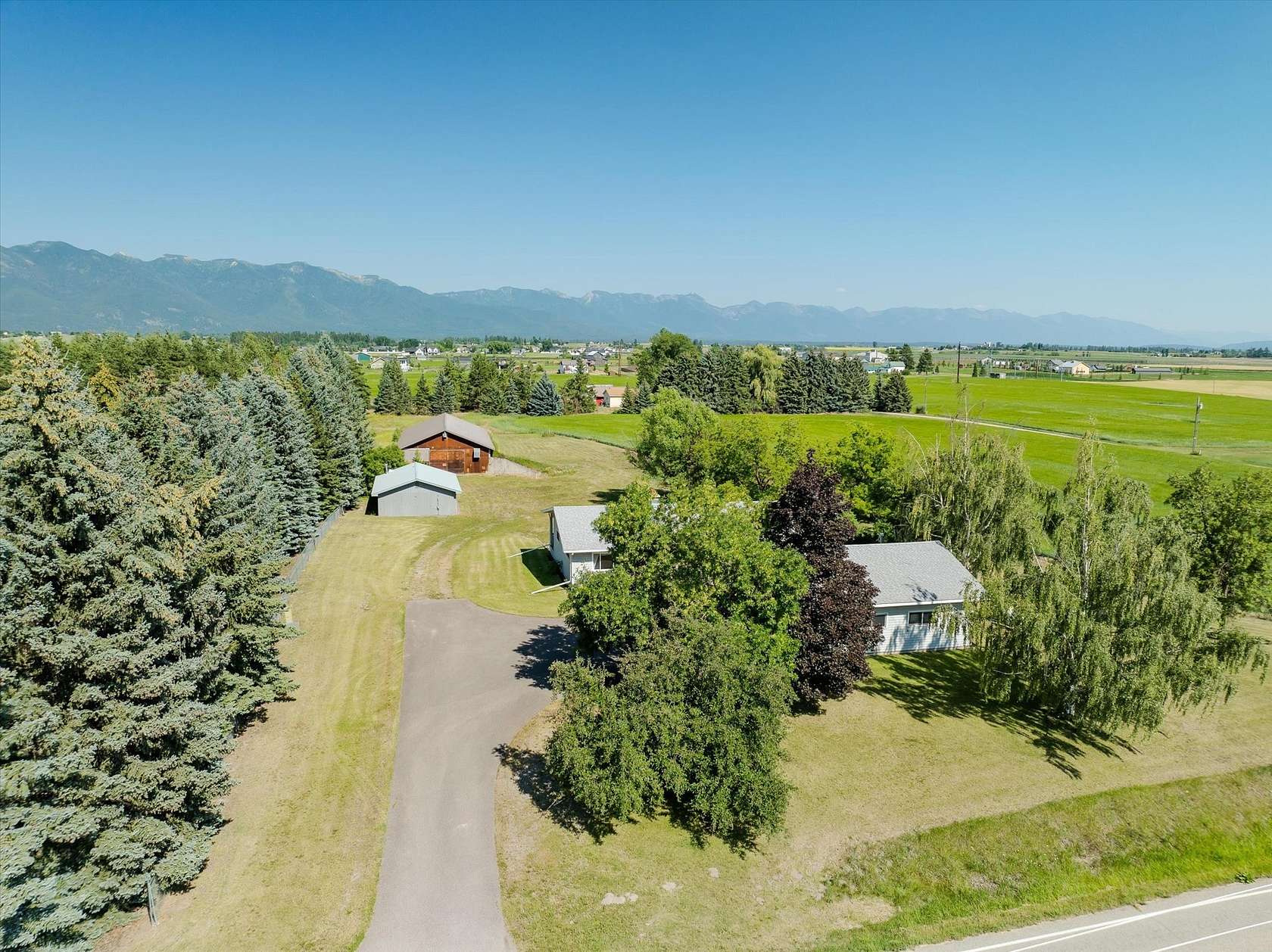5 Acres of Land with Home for Sale in Kalispell, Montana