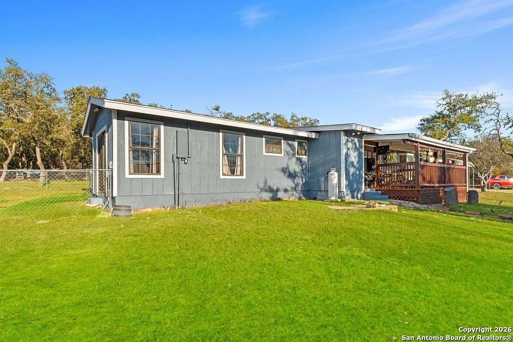 10 Acres of Residential Land with Home for Sale in Pipe Creek, Texas