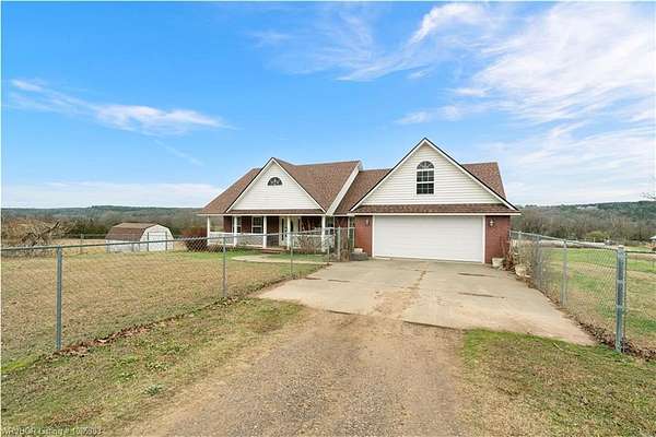 79 Acres of Land with Home for Auction in Waldron, Arkansas