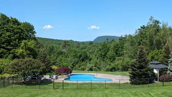 2.33 Acres of Land with Home for Sale in Bedford, New Hampshire