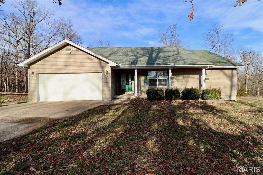 10.7 Acres of Land with Home for Sale in Lebanon, Missouri