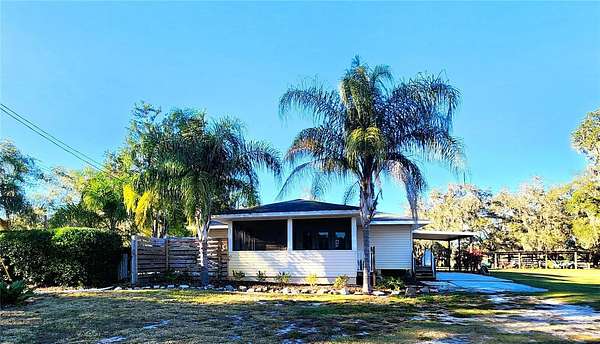 25.7 Acres of Agricultural Land with Home for Sale in Polk City, Florida